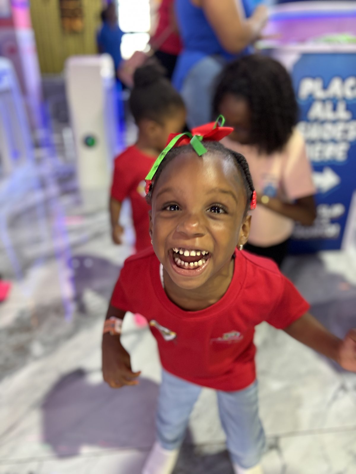 Laughing girl at a birthday celebration