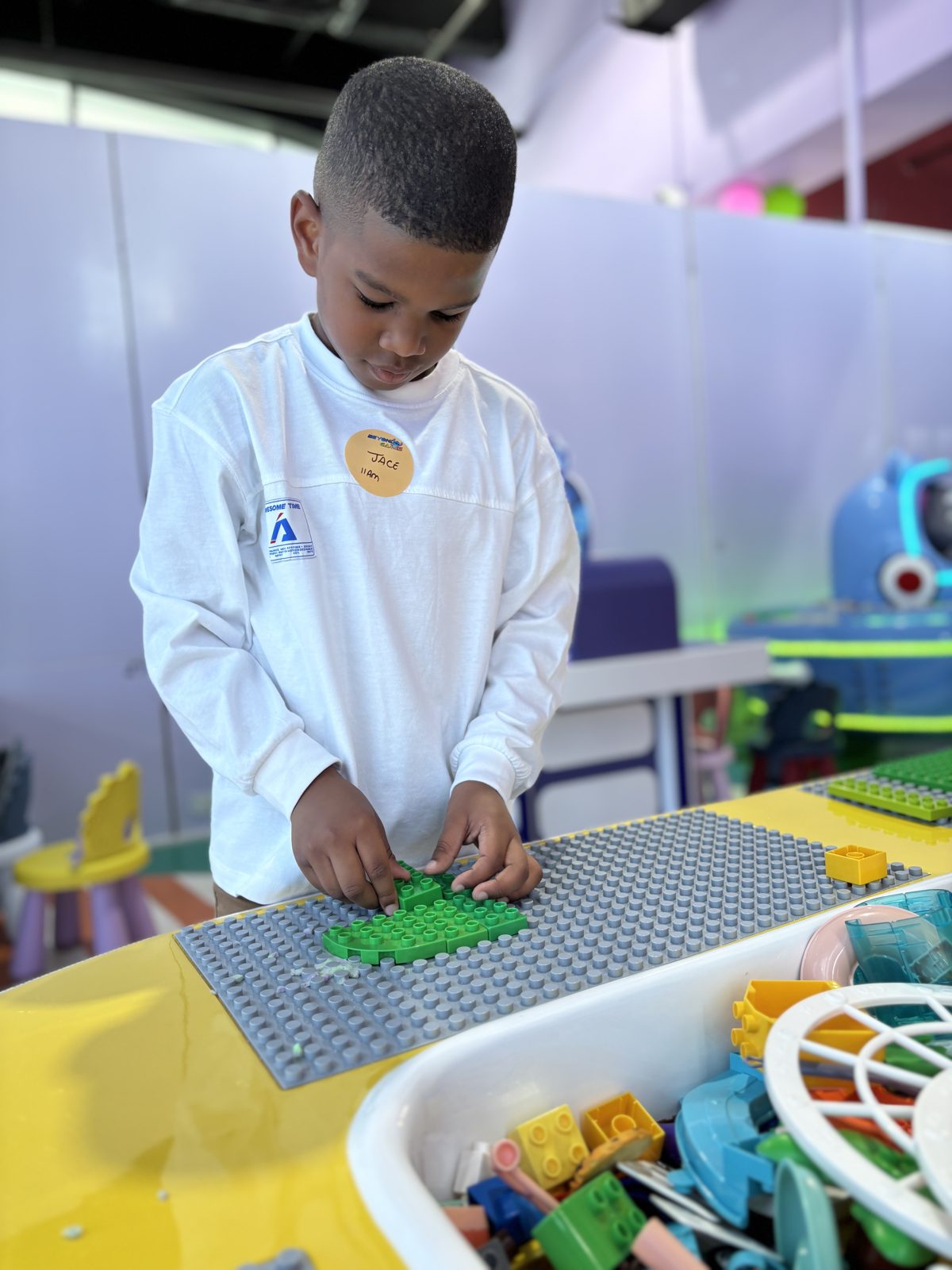 Boy building with construction blocks