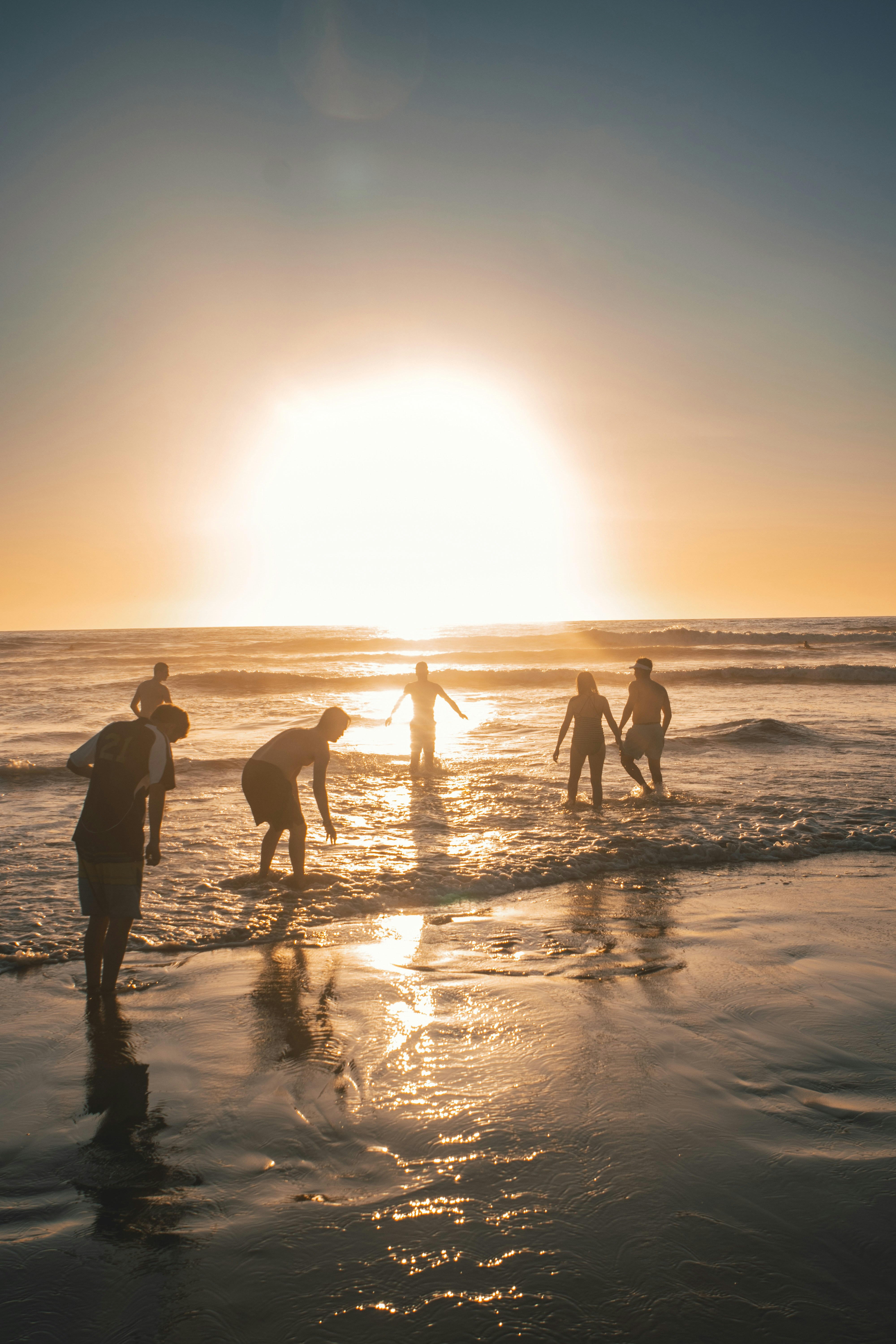 Caregiver enjoying sunset surf session