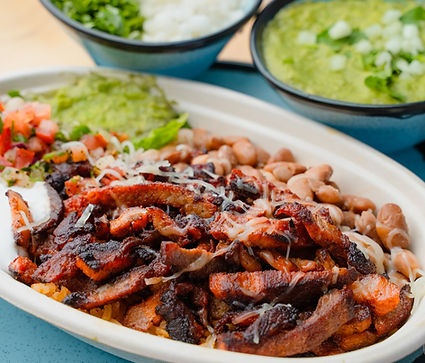Carne asada fries piled high with toppings