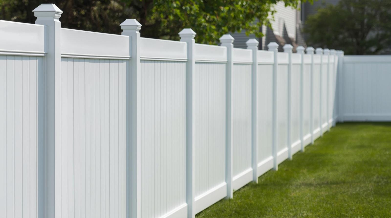 Vinyl fence installation on residential property in Edgerton WI.
