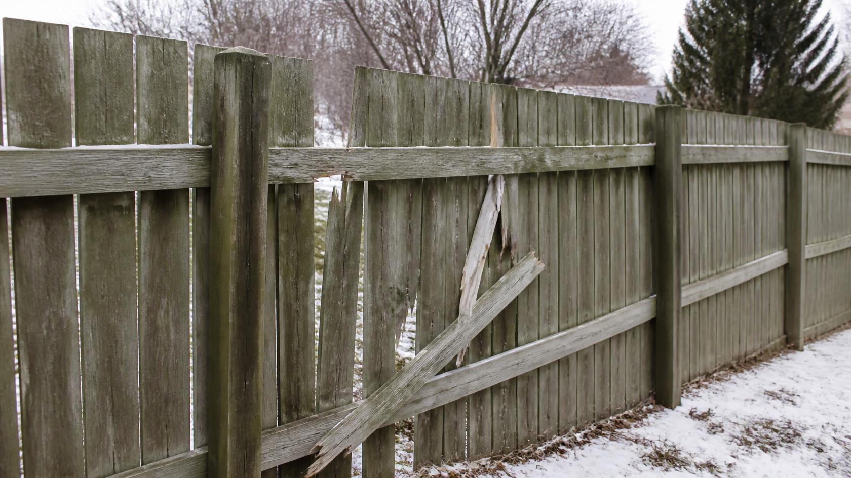 Wood fence in Roscoe, IL being repaired for damaged posts, panels, and other problems before snow and ice arrive.