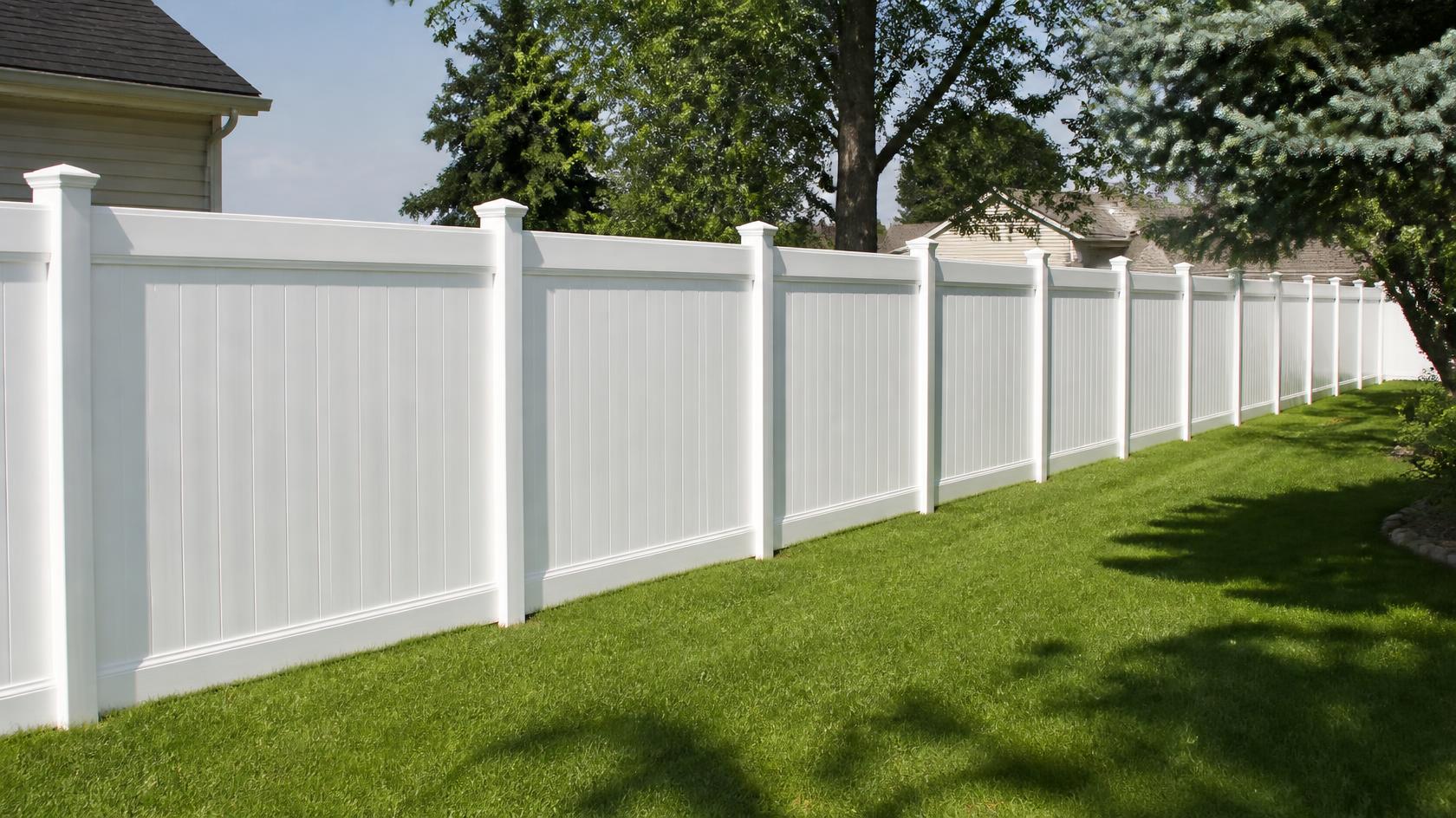 Vinyl fence project in Mount Carroll, IL with homeowners considering materials, layout, labor, and other factors that affect installation cost.