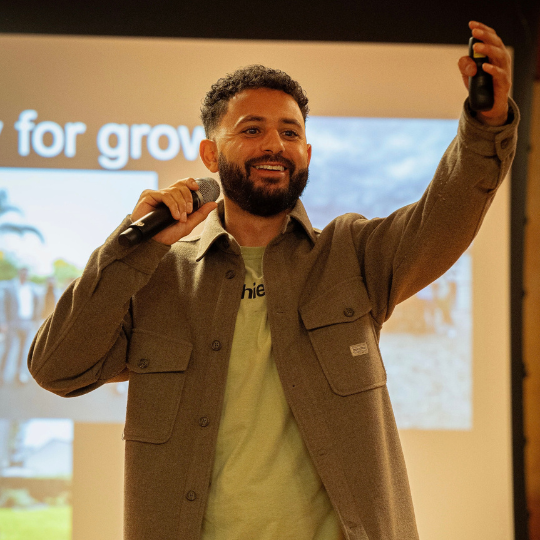 Samer presenting to his team