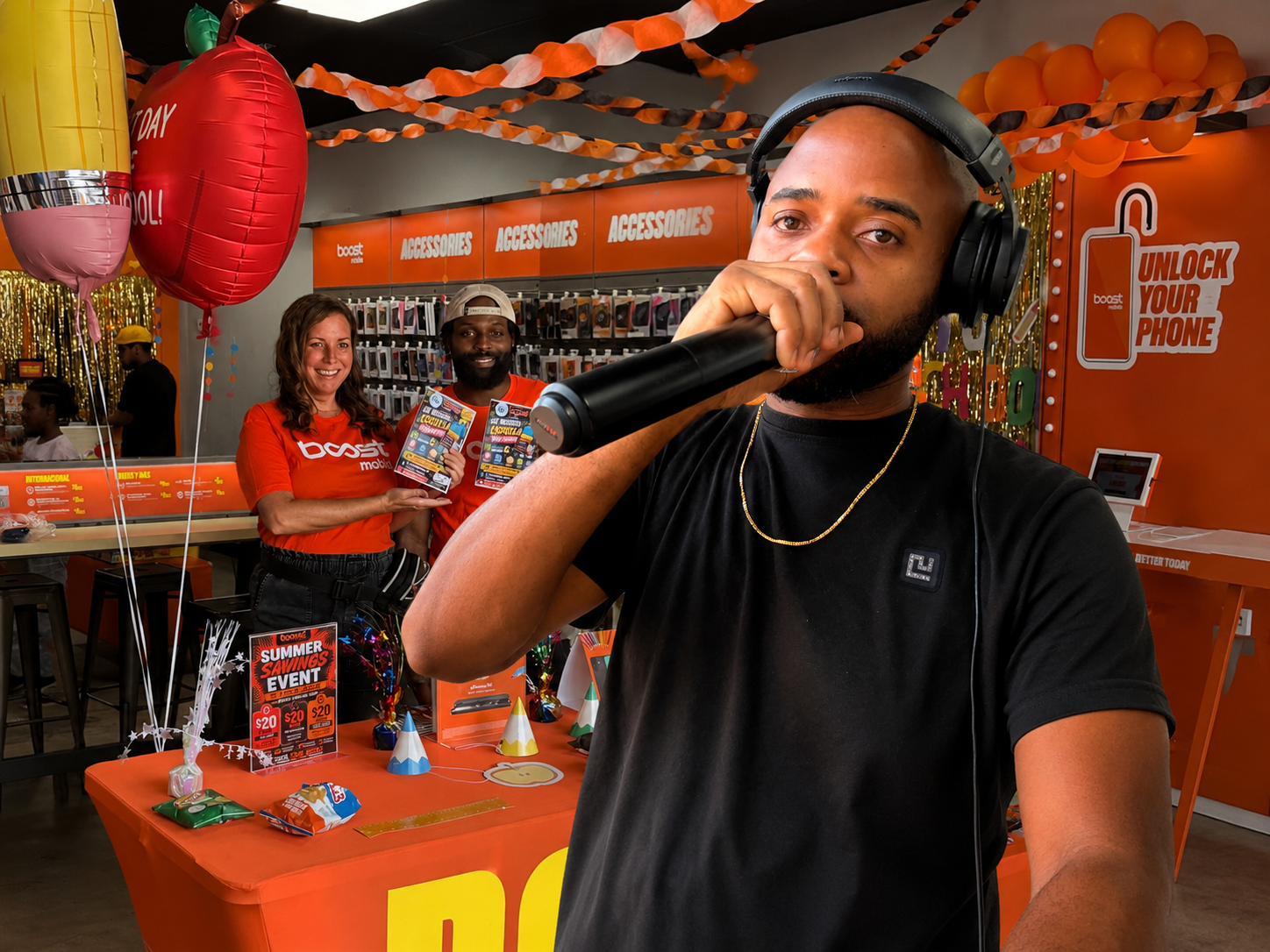 DJ Outlet hosting a Boost Mobile brand activation