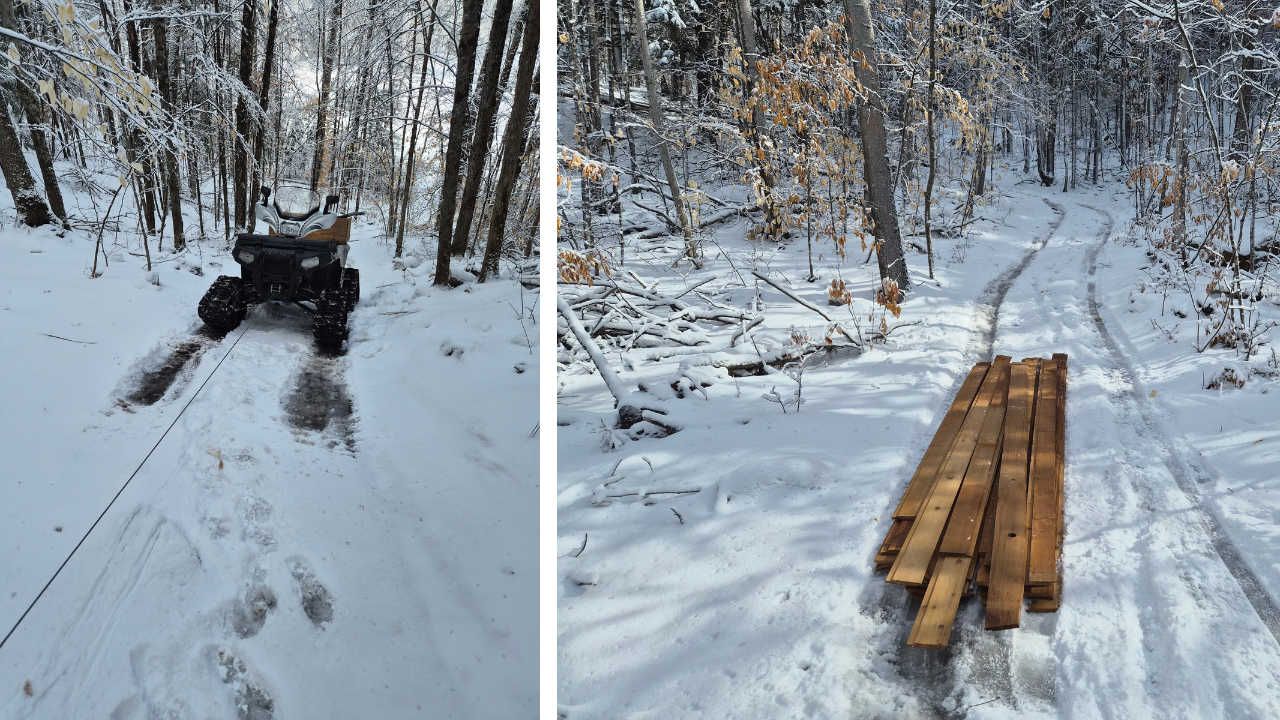 ATV winching up icy forest trail after trailer load of cedar boards slid off during off-grid cabin build ATV winching up icy forest trail after trailer load of cedar boards slid off during off-grid cabin build