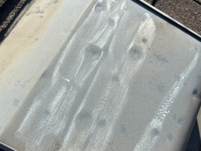 Hail dents on metal flashing and drip edge