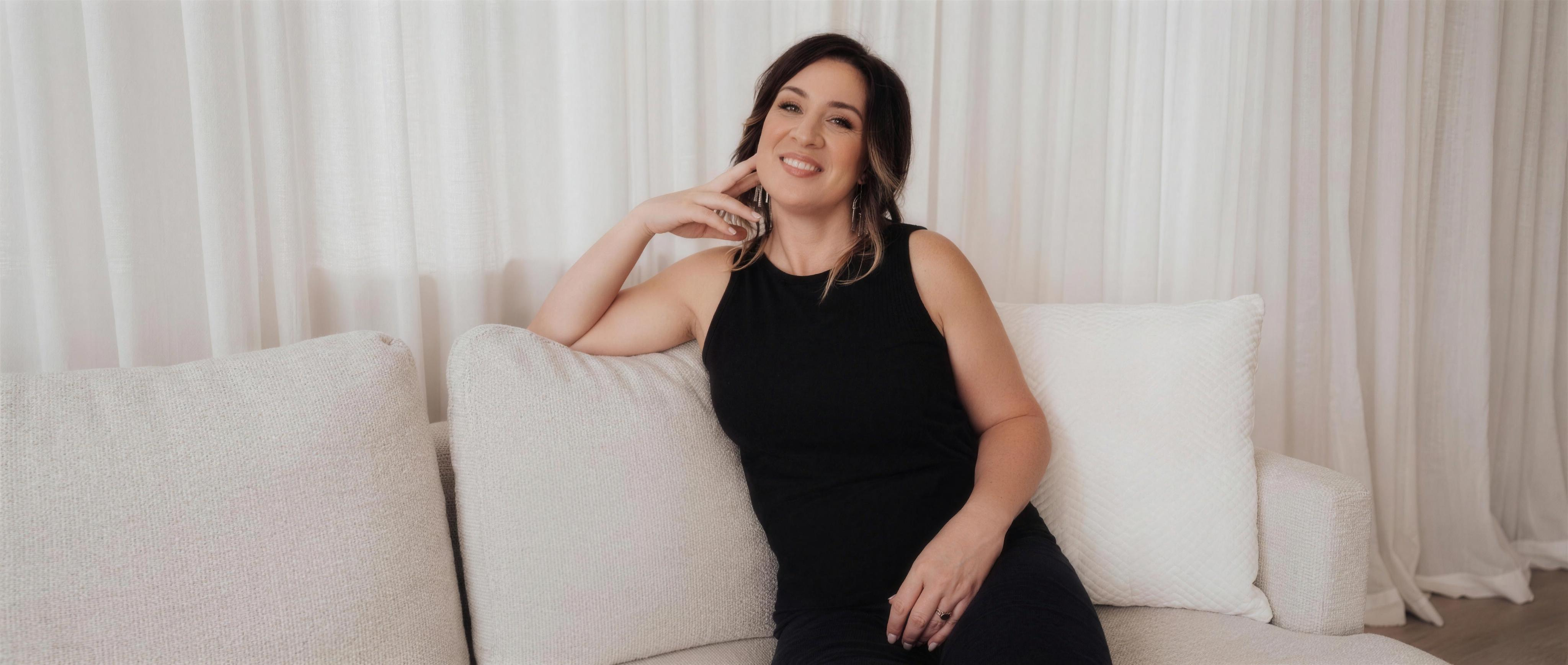Erica Bennett seated, facing forward