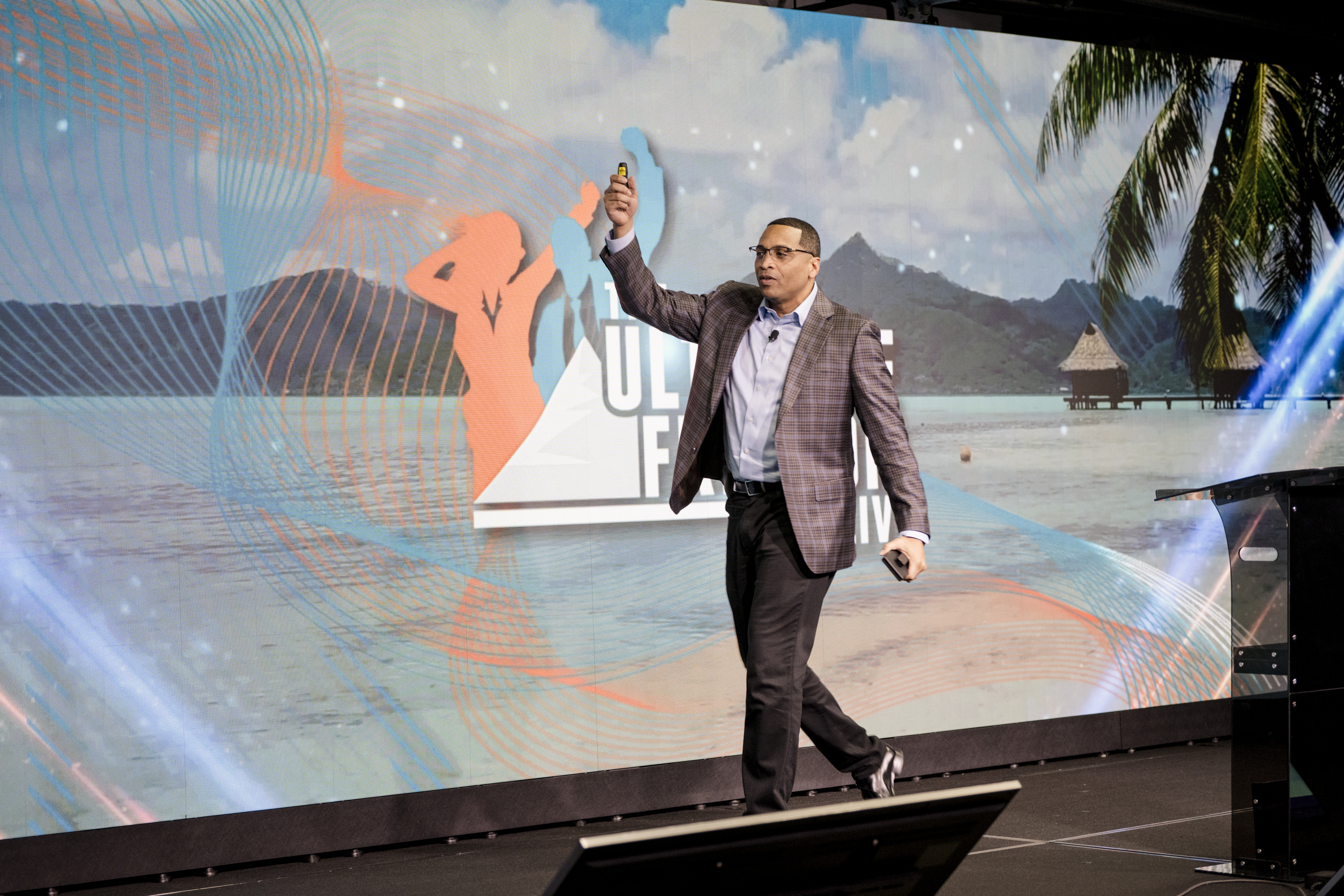 Michael E. Parker on stage at a previous Ultimate Freedom LIVE event