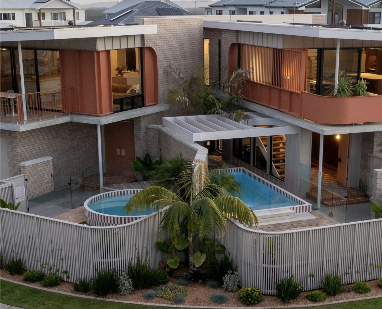 Architectural Plungie pool installed in a landscaped Australian courtyard