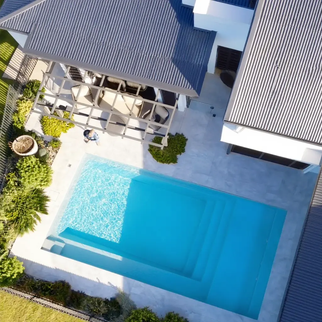 Aerial view of the Courtyard Oasis fibreglass pool beside the Parkhurst home