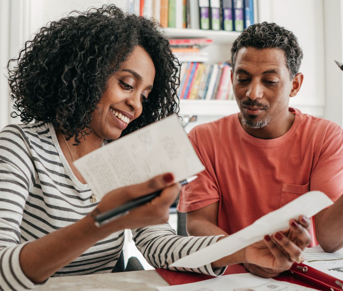 Homeowners reviewing their options at home