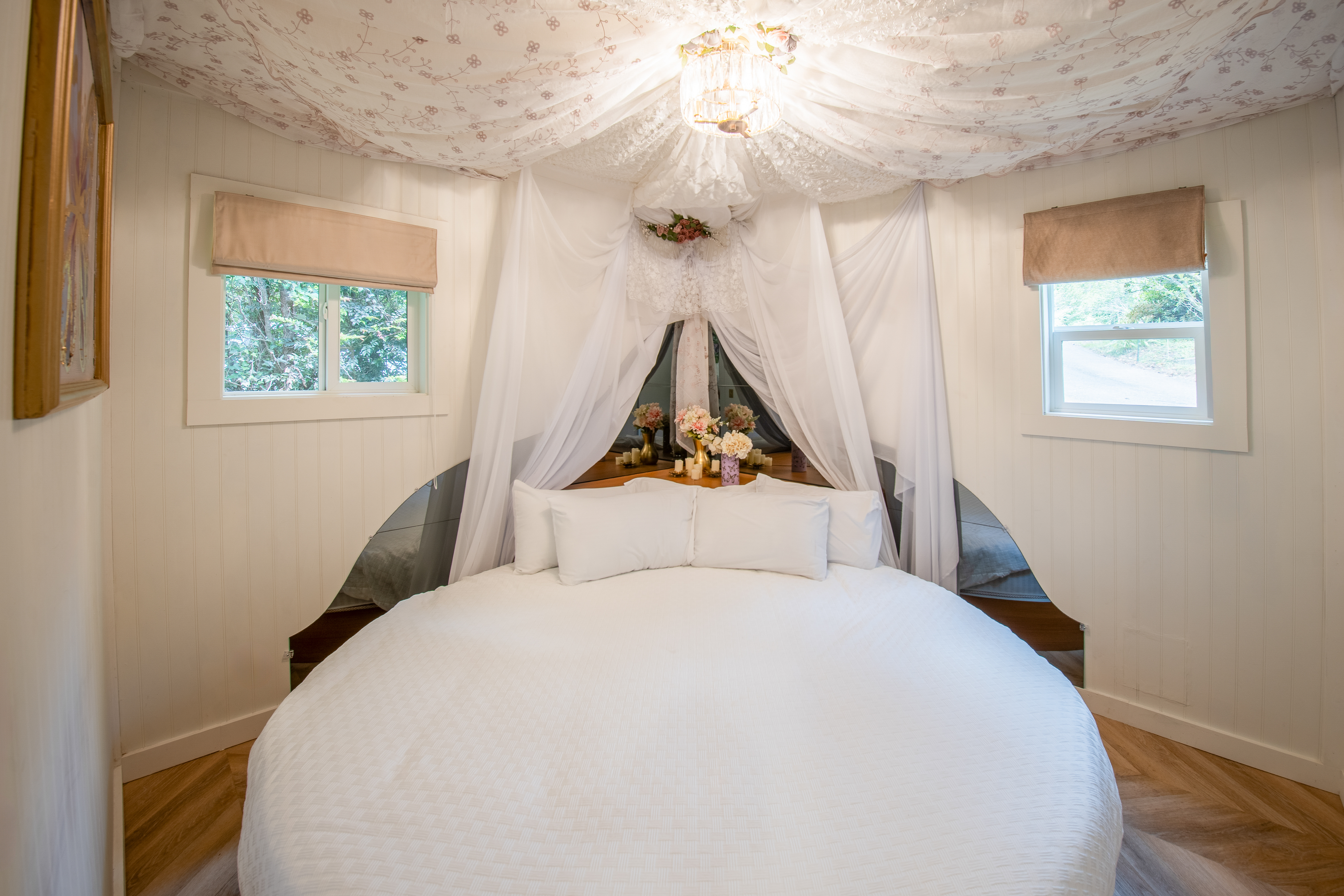 Round king bed in the Lavender Loft, one of the most romantic cabins on the Oregon Coast near Florence Round king bed in the Lavender Loft, one of the most romantic cabins on the Oregon Coast near Florence