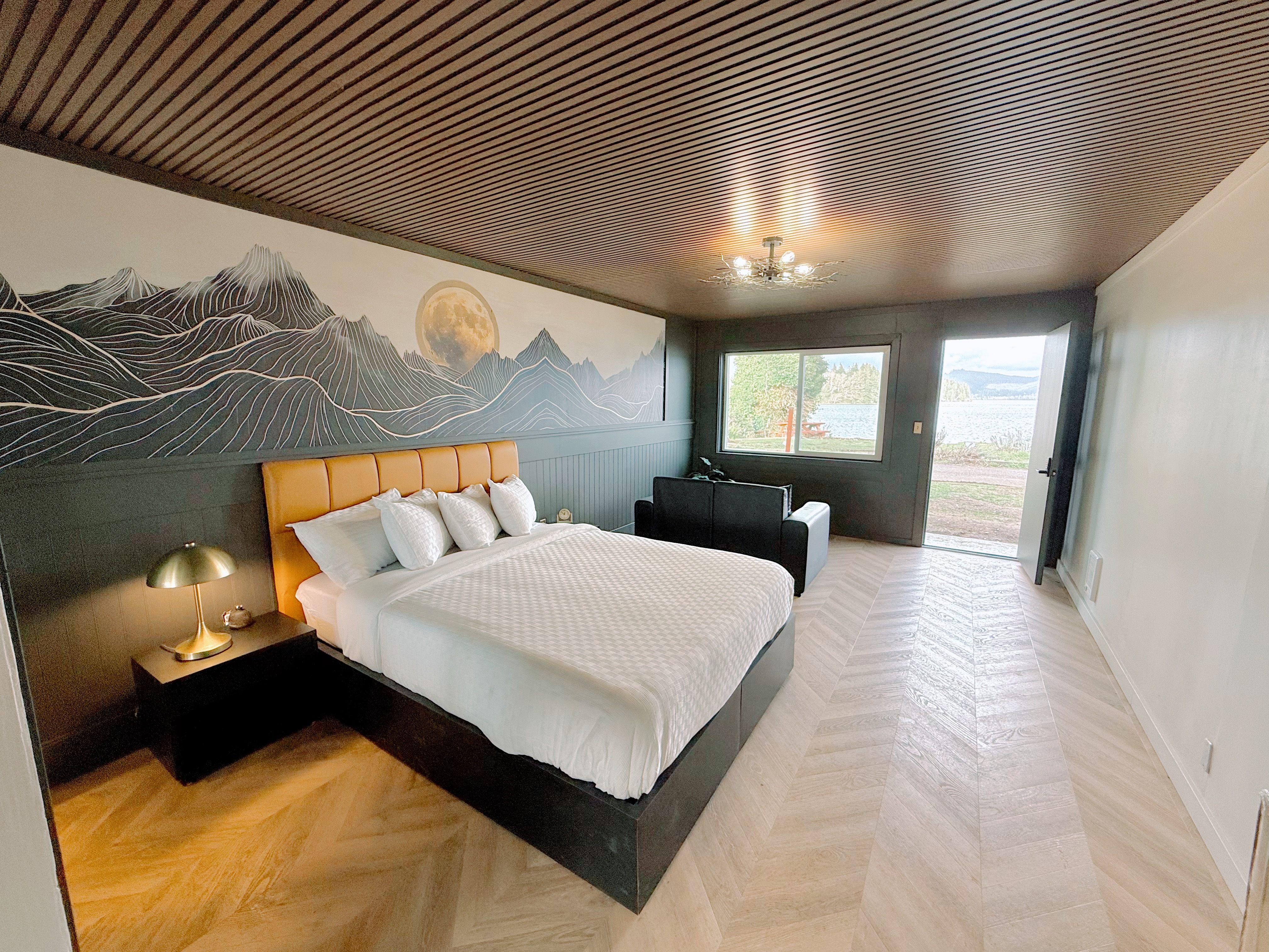 Midnight Marina Room studio cabin with lake view at The Florentine Waterfront Hotel, Oregon Coast Midnight Marina Room studio cabin with lake view at The Florentine Waterfront Hotel, Oregon Coast