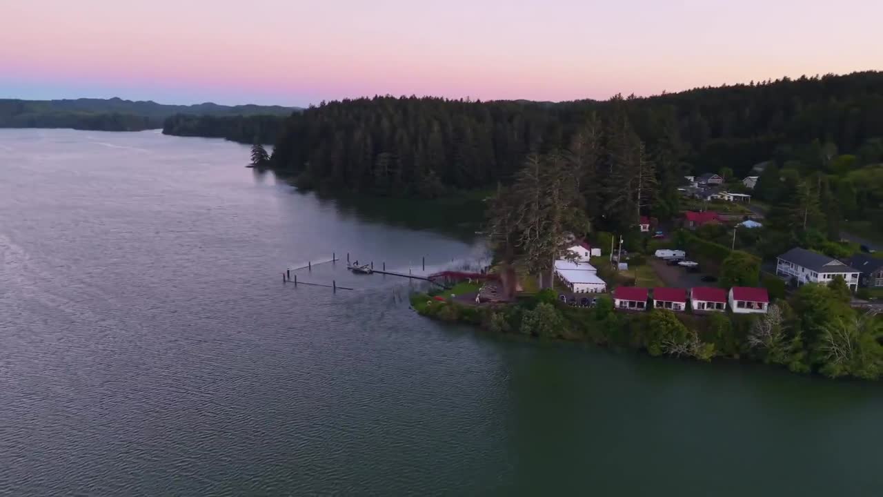 Aerial view of eight unique cabin designs on the Oregon Coast at Siltcoos Lake near Florence, Oregon Aerial view of eight unique cabin designs on the Oregon Coast at Siltcoos Lake near Florence, Oregon