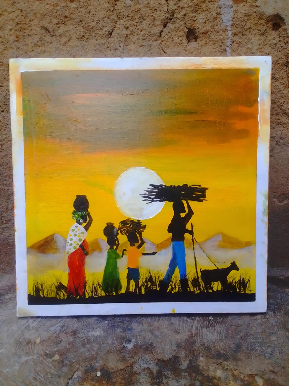A painting of women carrying water and firewood at sunset