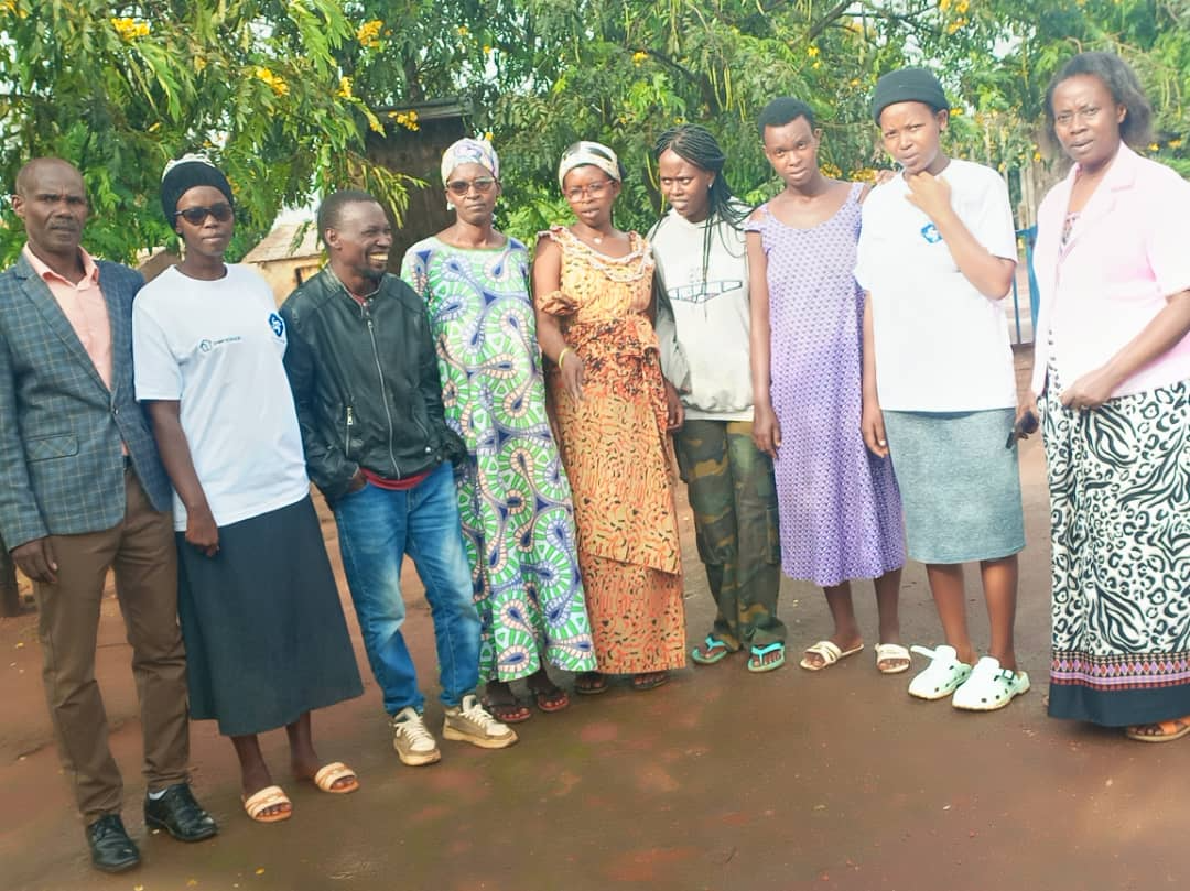 A community group standing together outside