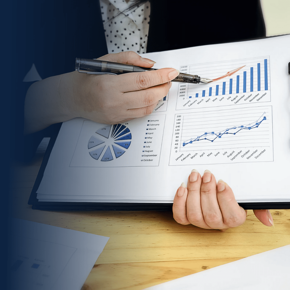 Interior designer reviewing charts for visual enhancement benefits, space transformation, and cost saving analysis of premium motorized screen solutions