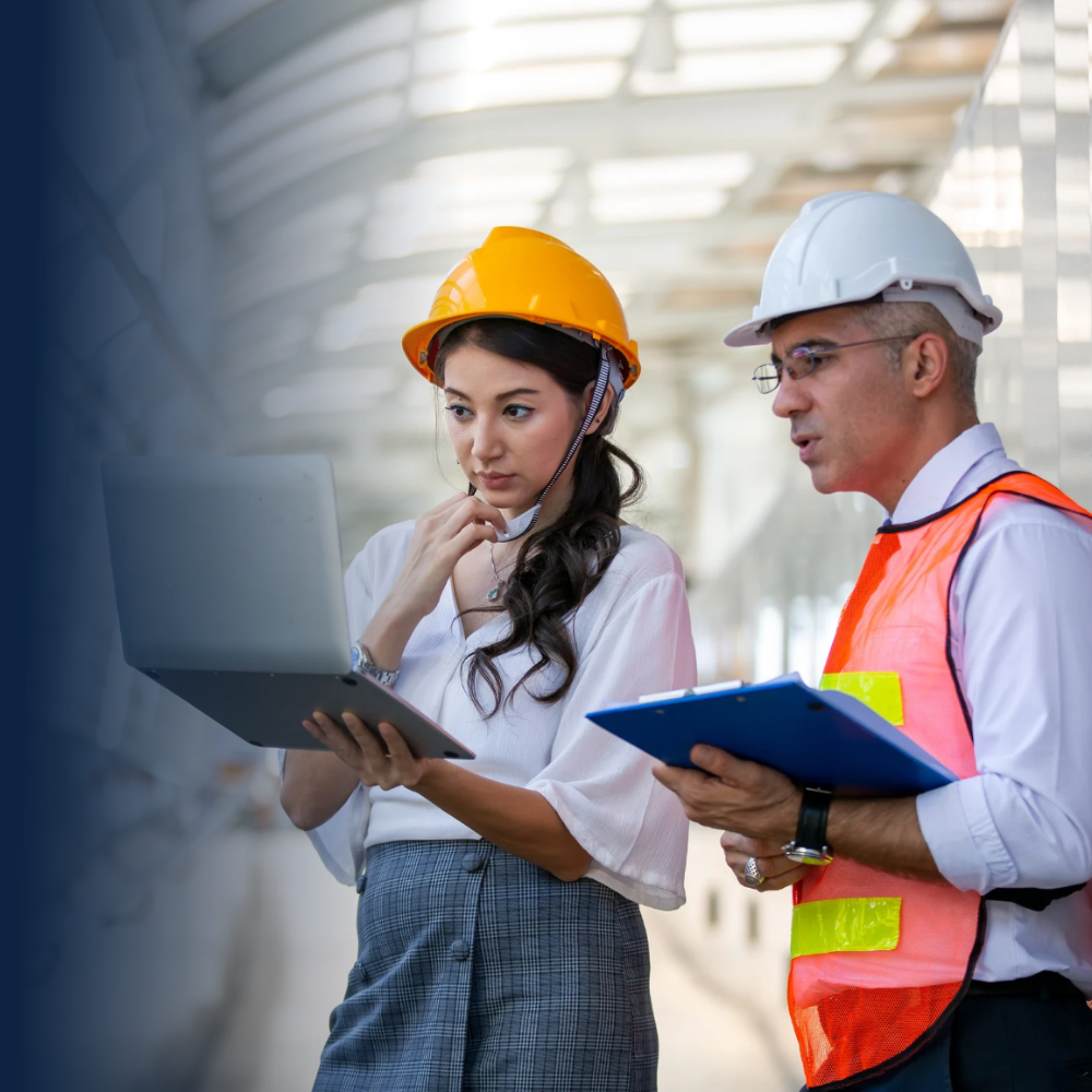 Engineering team examining technical specifications and compliance standards for motorized screens, incorporating calculations into documentation