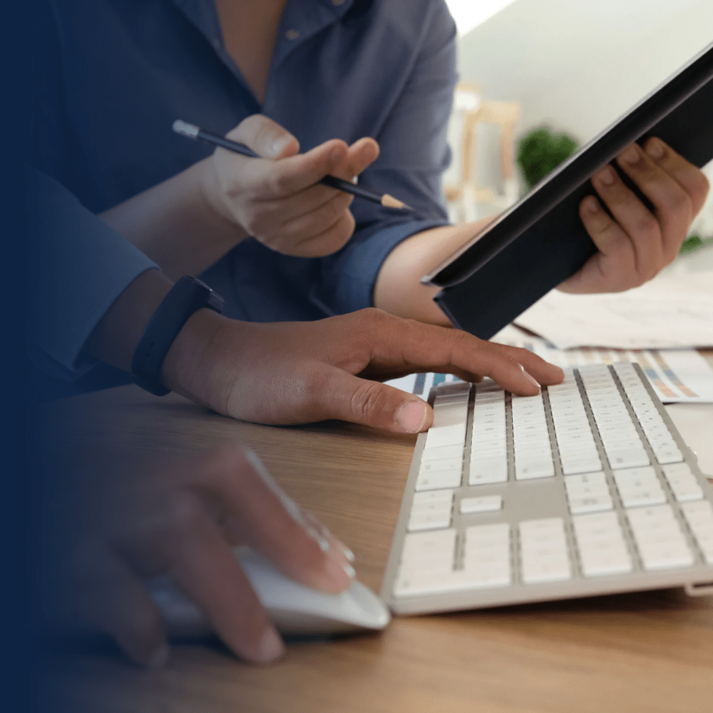 Interior designers planning motorized screen integration for aesthetic styling, reviewing design harmony and functional specification on tablet and computer