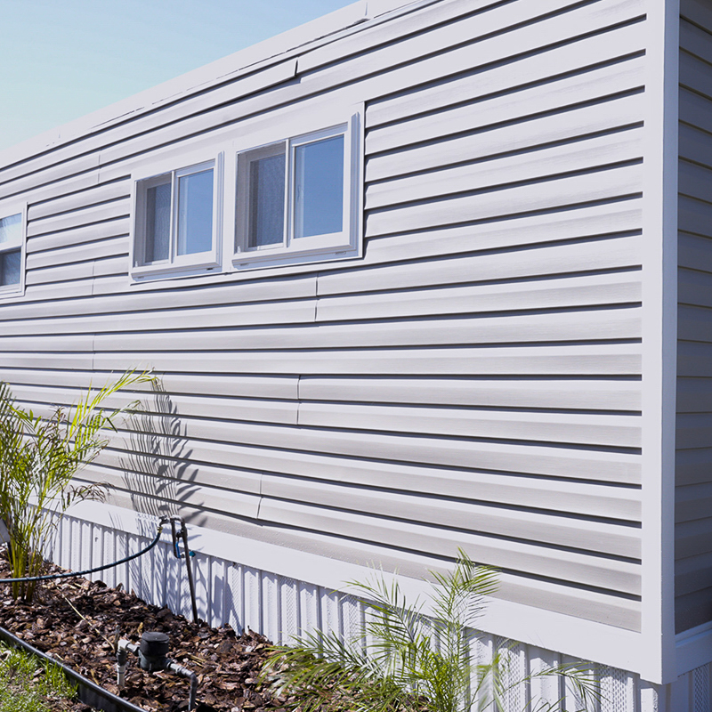 At Vapor Barrier Palm Harbor, we specialize in protecting your mobile home's foundation. In this photo, our expert team is providing mobile home services for a homeowner in Palm Harbor, FL.