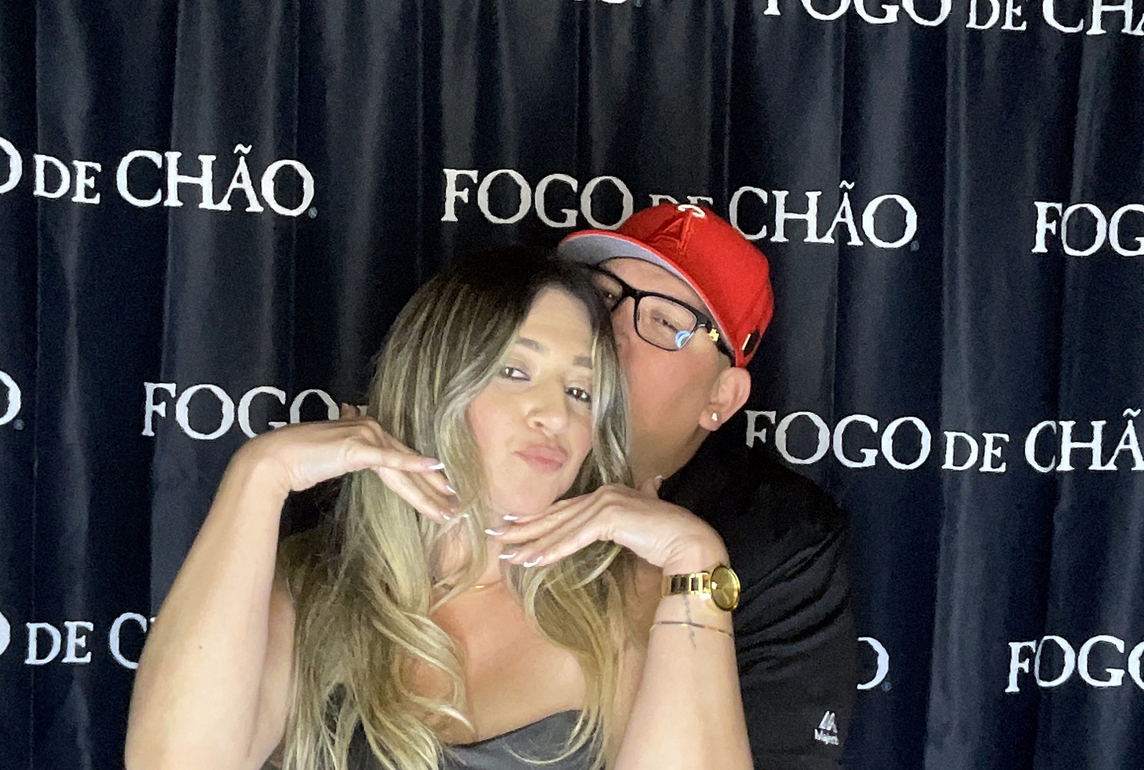 Couple posing at the Fogo de Chão Brea Valentine’s Day 2026 photo booth