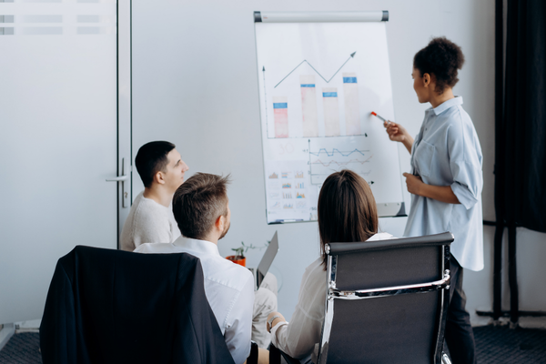 Leadership team analysing workplace data and feedback