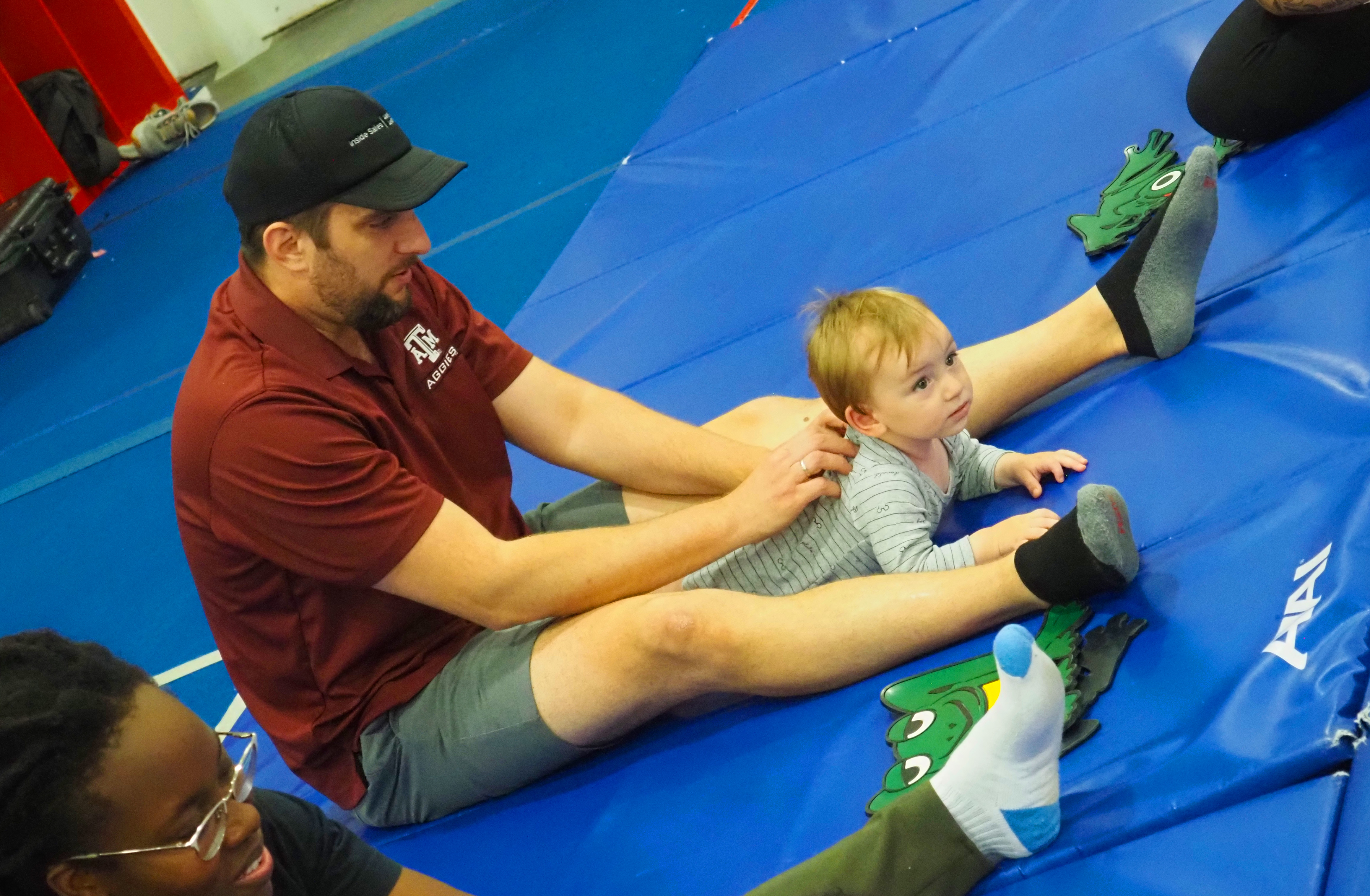 Caregiver and child enjoying a Born to Move class