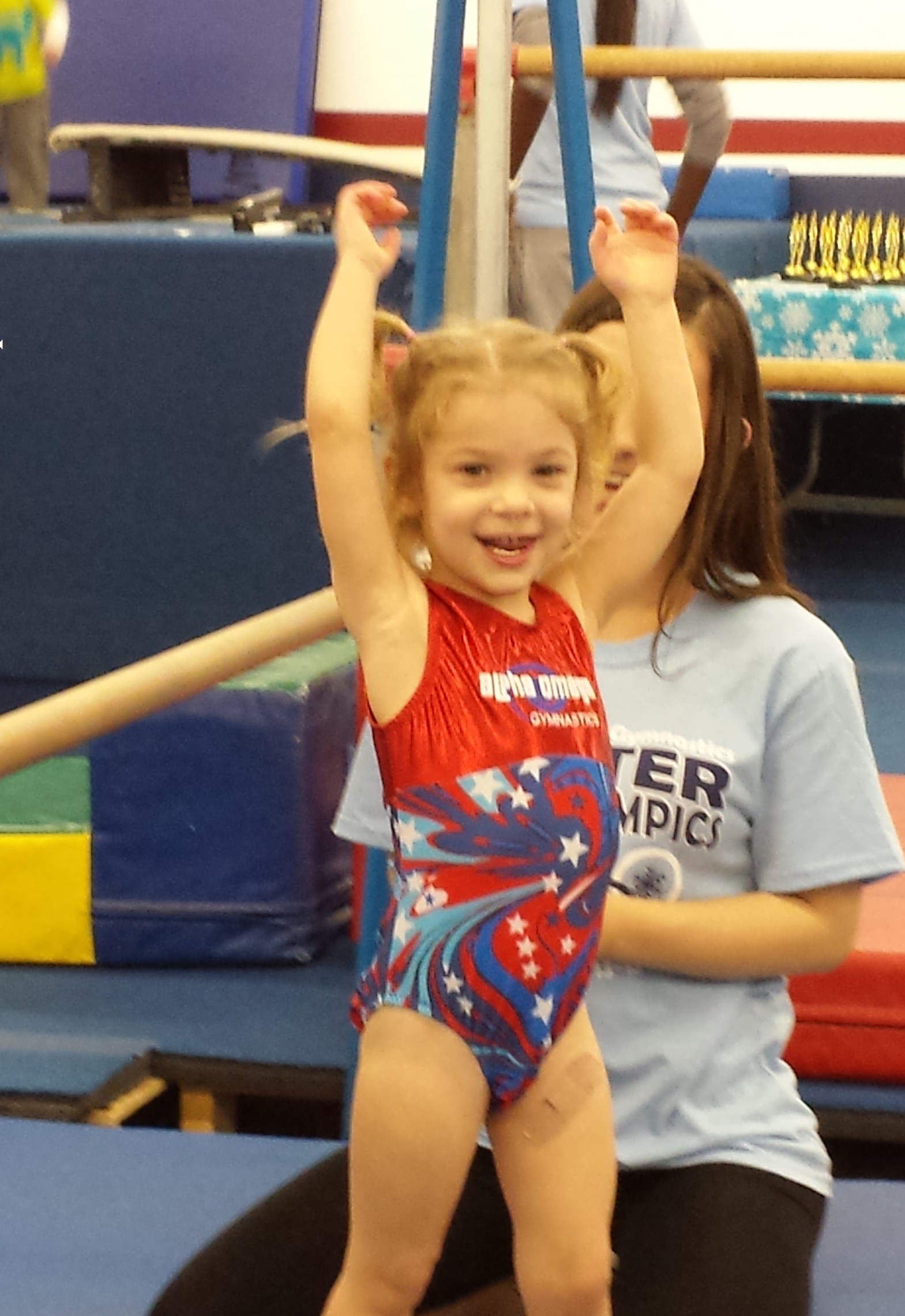 Young gymnast participating in a preschool class
