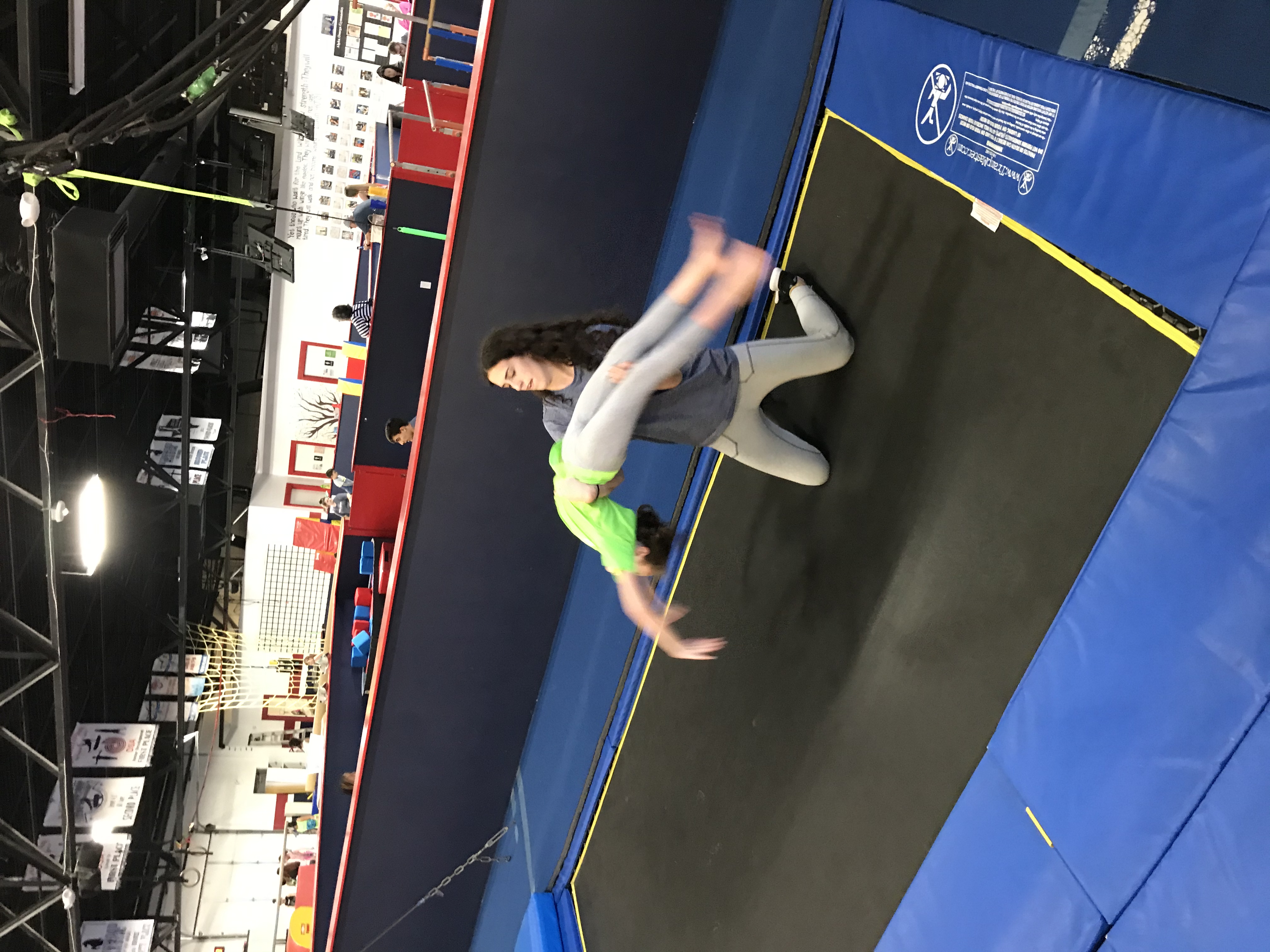 Girl working on a gymnastics skill