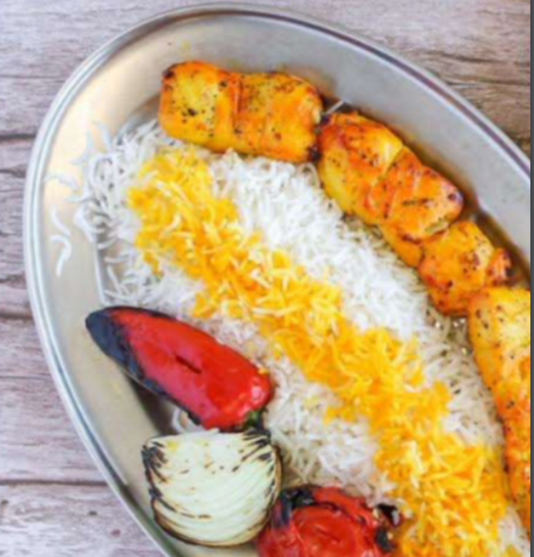 Chicken Kabob marinated in lemon and saffron, served with saffron basmati rice at Chop Kabob