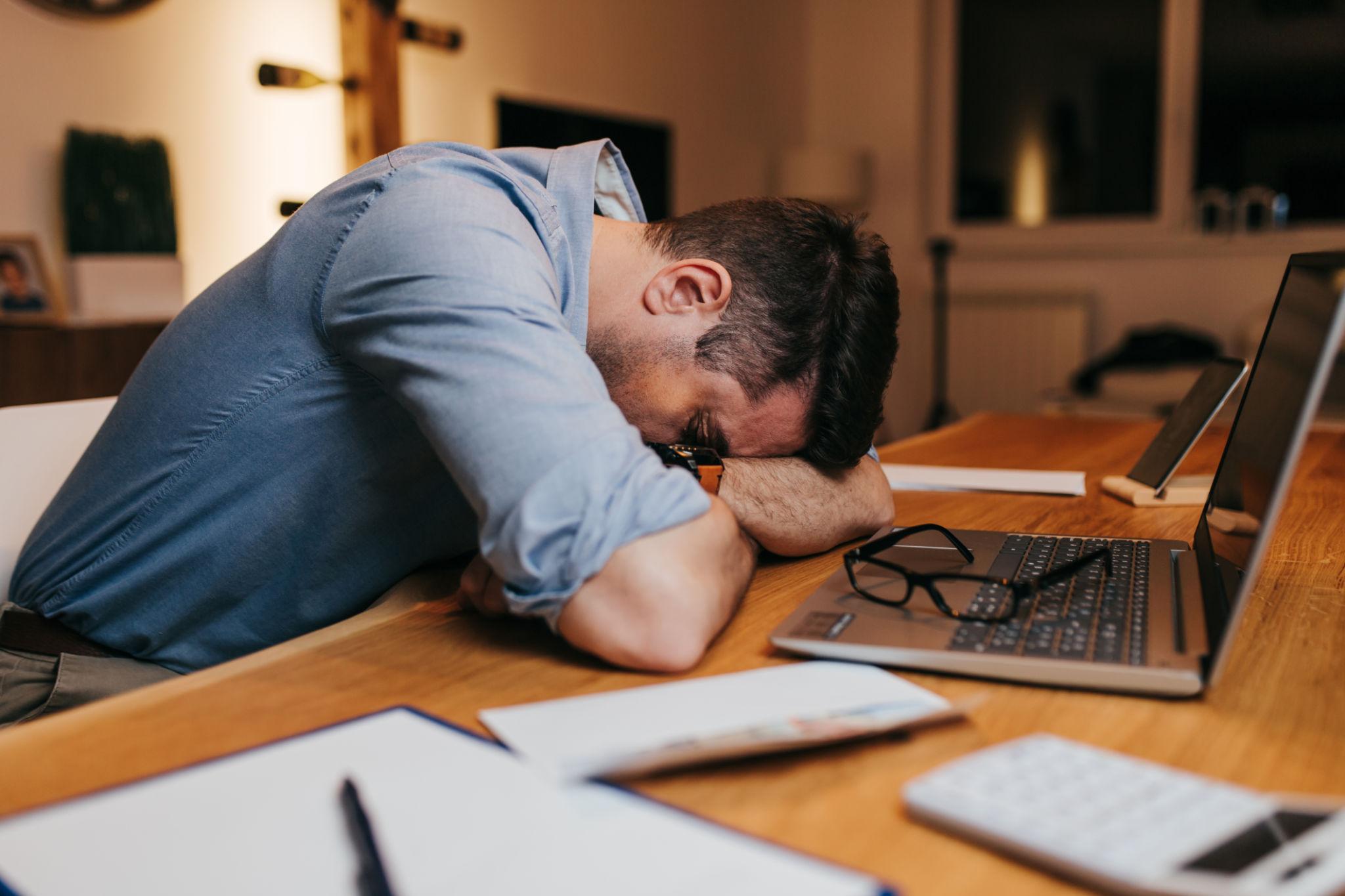 middle aged man fatigue low energy chronic illness symptom