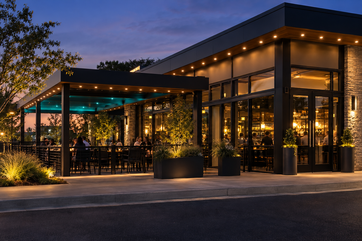 Restaurant and bar patio highlighted by professional permanent architectural lighting