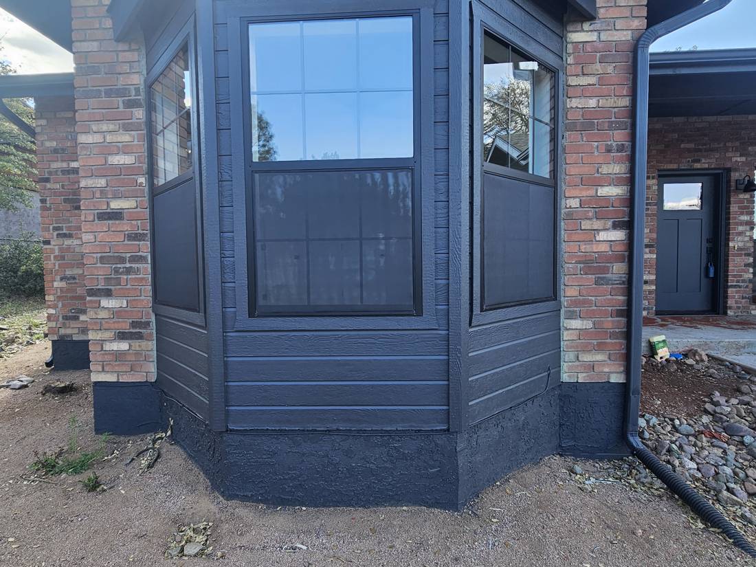 Solar screens on a bay window