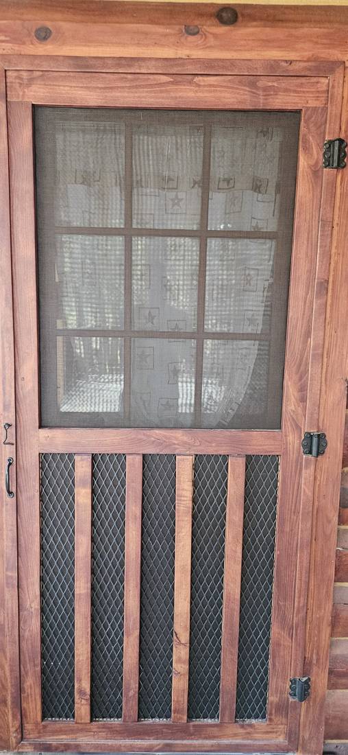 Custom wood screen door after service