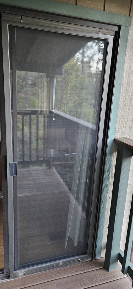 Sliding screen door after service