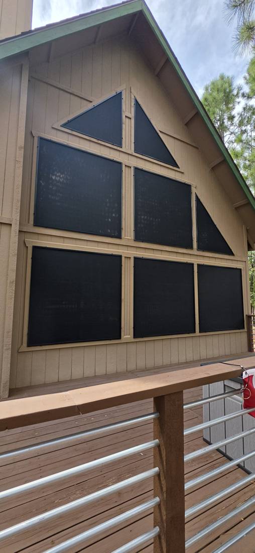 Solar screens on a tall A-frame gable