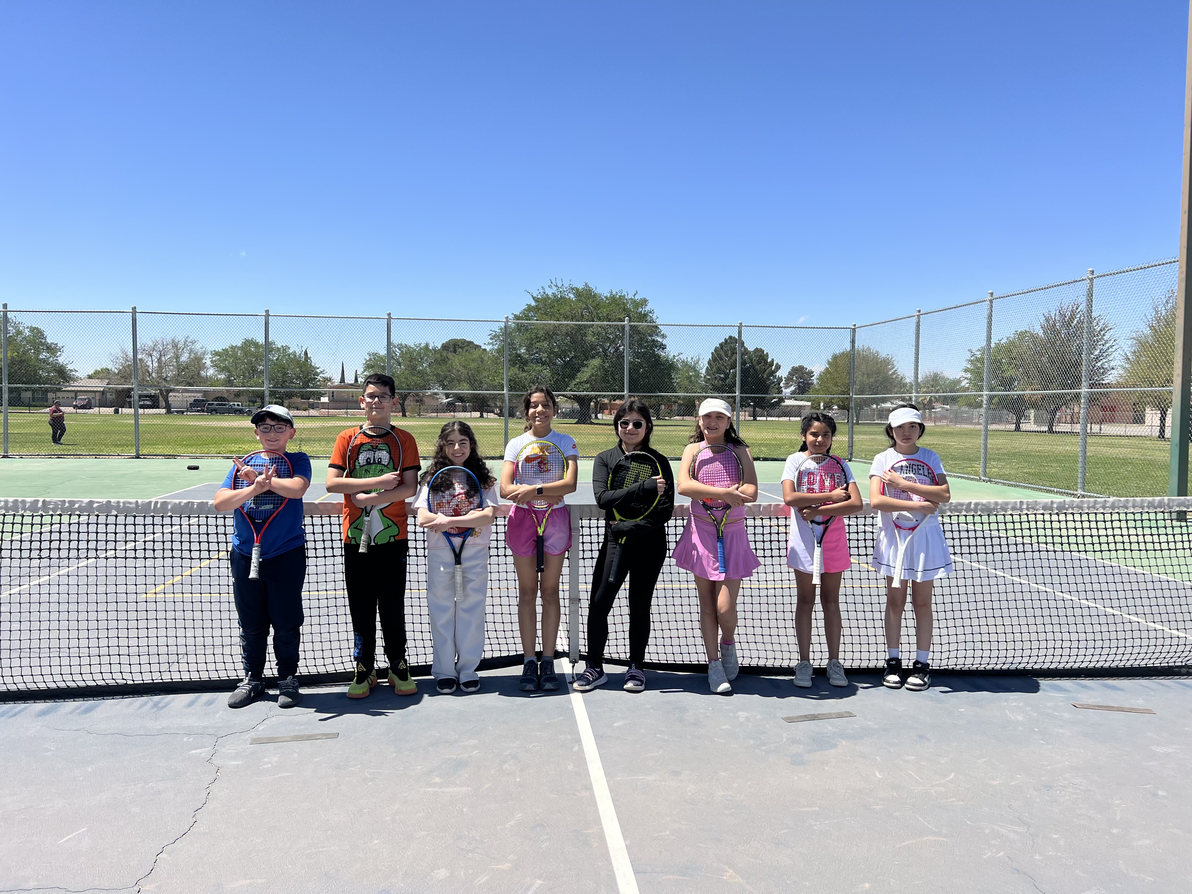 Kids playing tennis