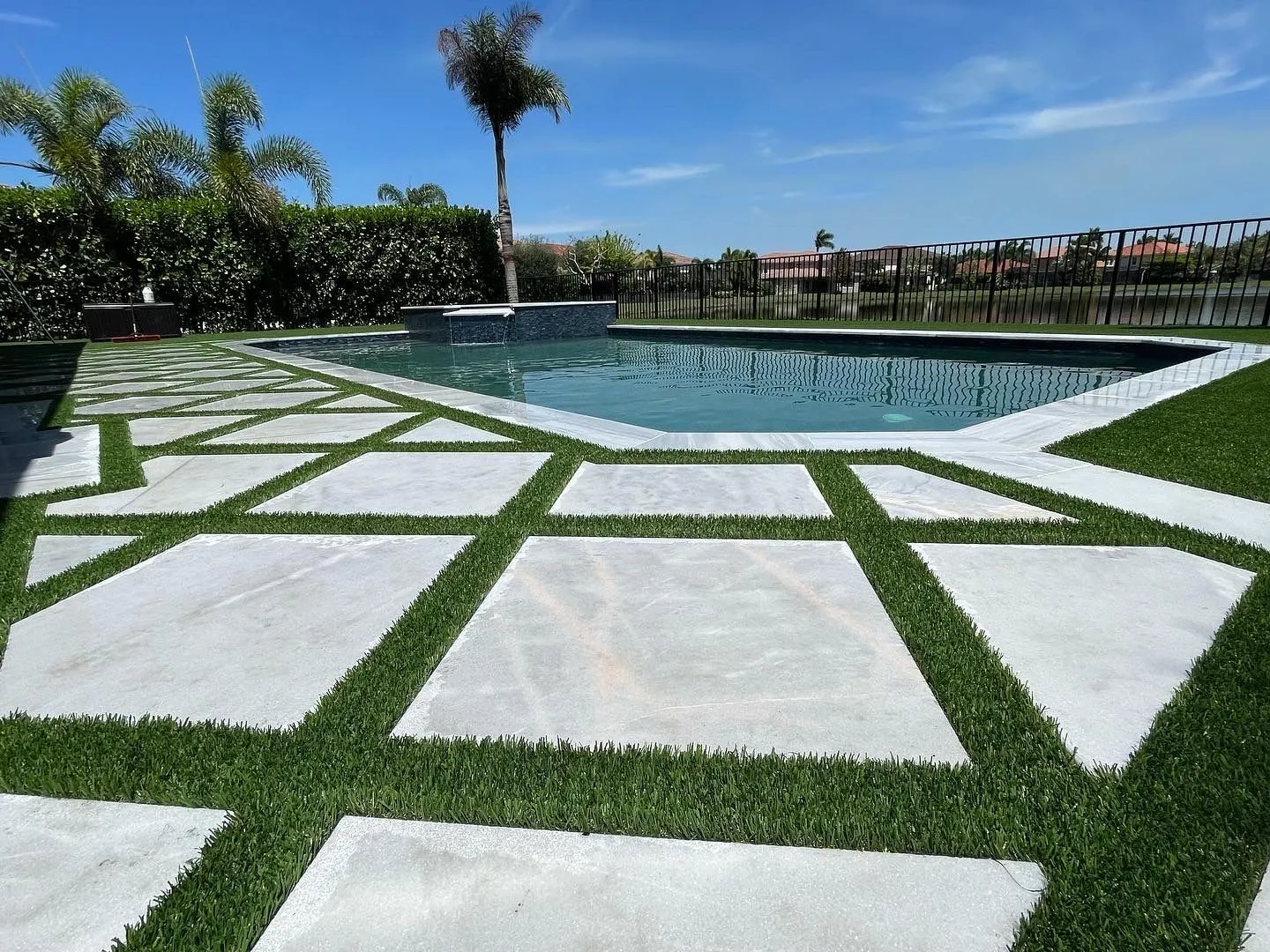 Pool surround with pavers and turf