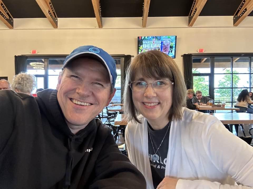 Tim & Pam with local business
