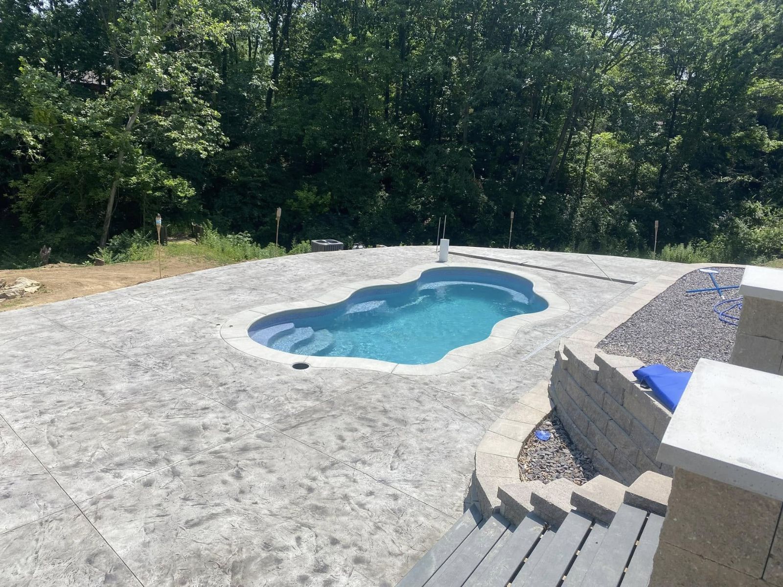 Pool deck and surrounding outdoor space