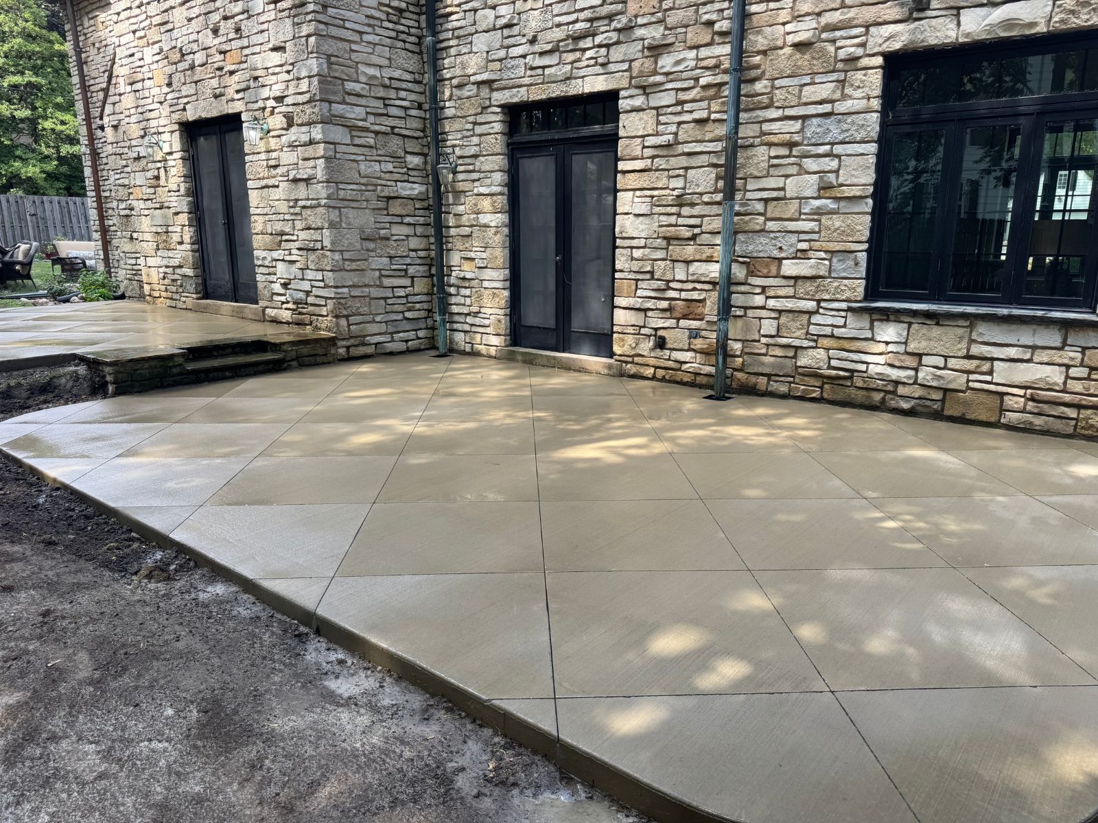Concrete patio and outdoor living space