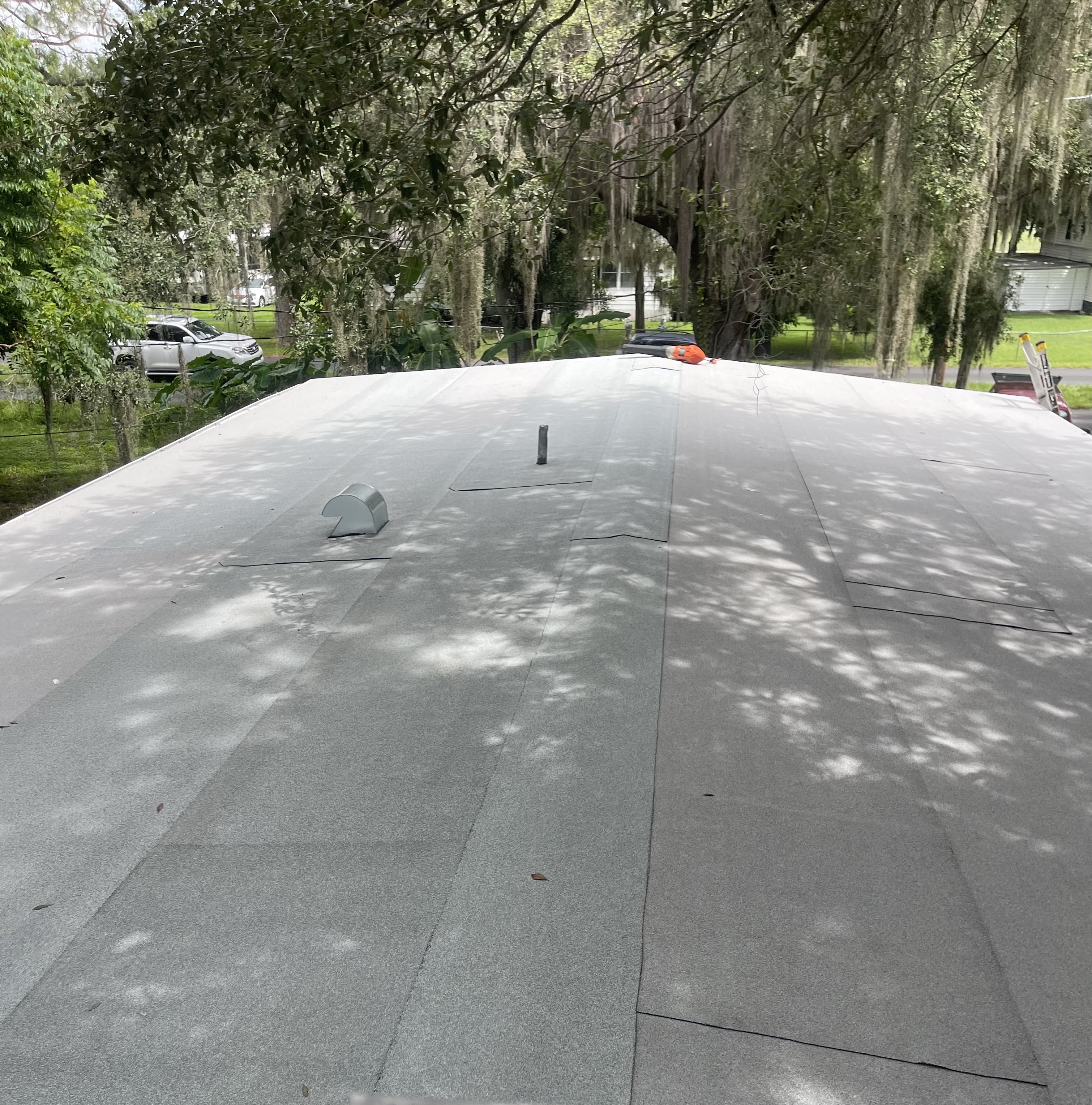 Commercial flat roof coating work by Allied Construction and Roofing