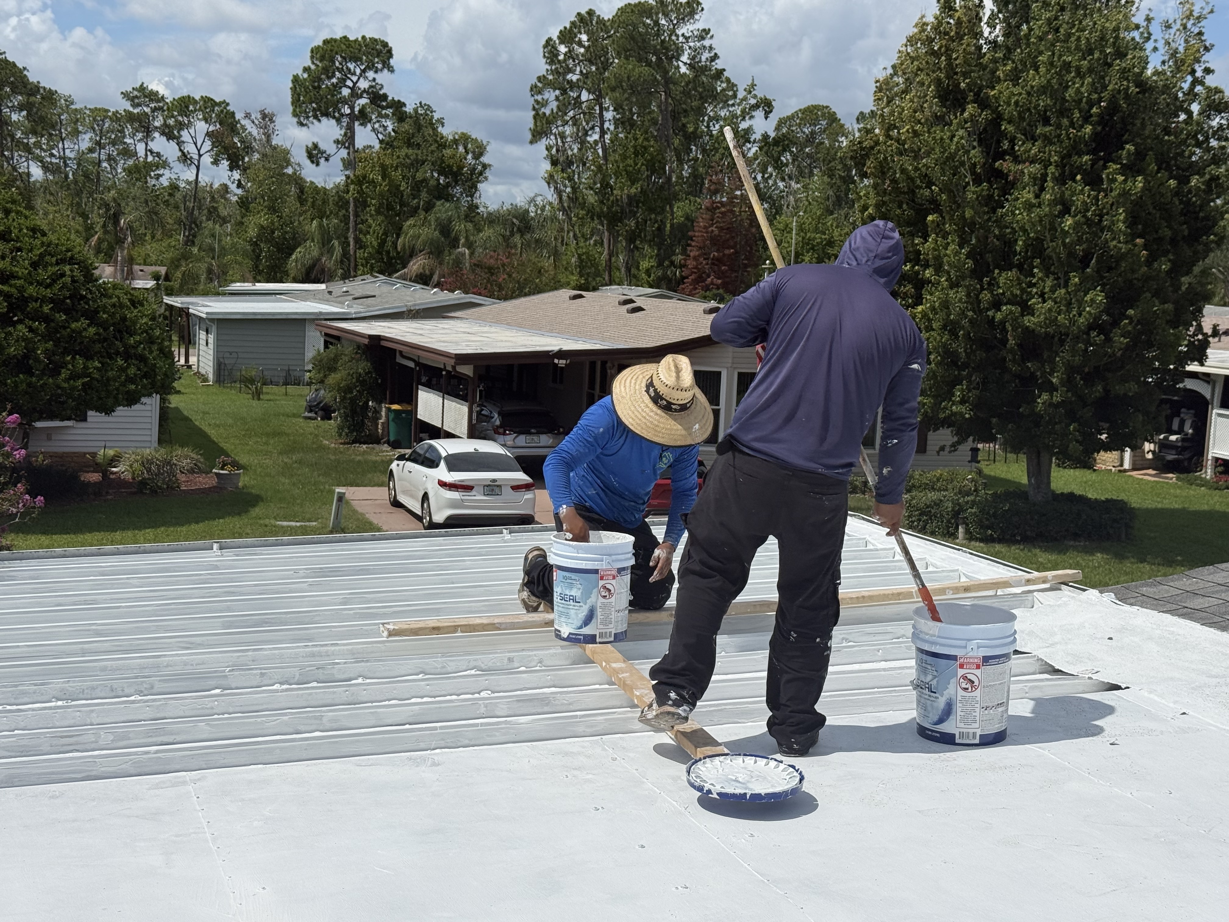 Roofing crew by Allied Construction and Roofing