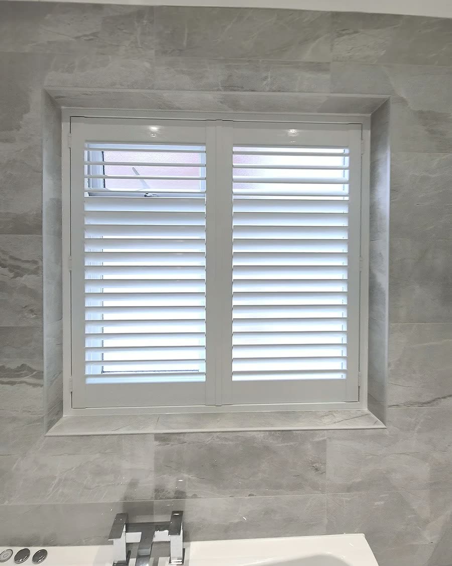 Waterproof PVC plantation shutters in a bathroom in Atherton