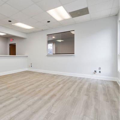 Office or retail space renovation featuring new flooring