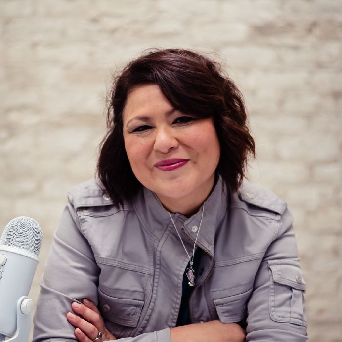 Business Consultant & Entrepreneur working on laptop feeling relieved and confident after taking the 5 Star Foundations Course for QuickBooks setup and bookkeeping clarity