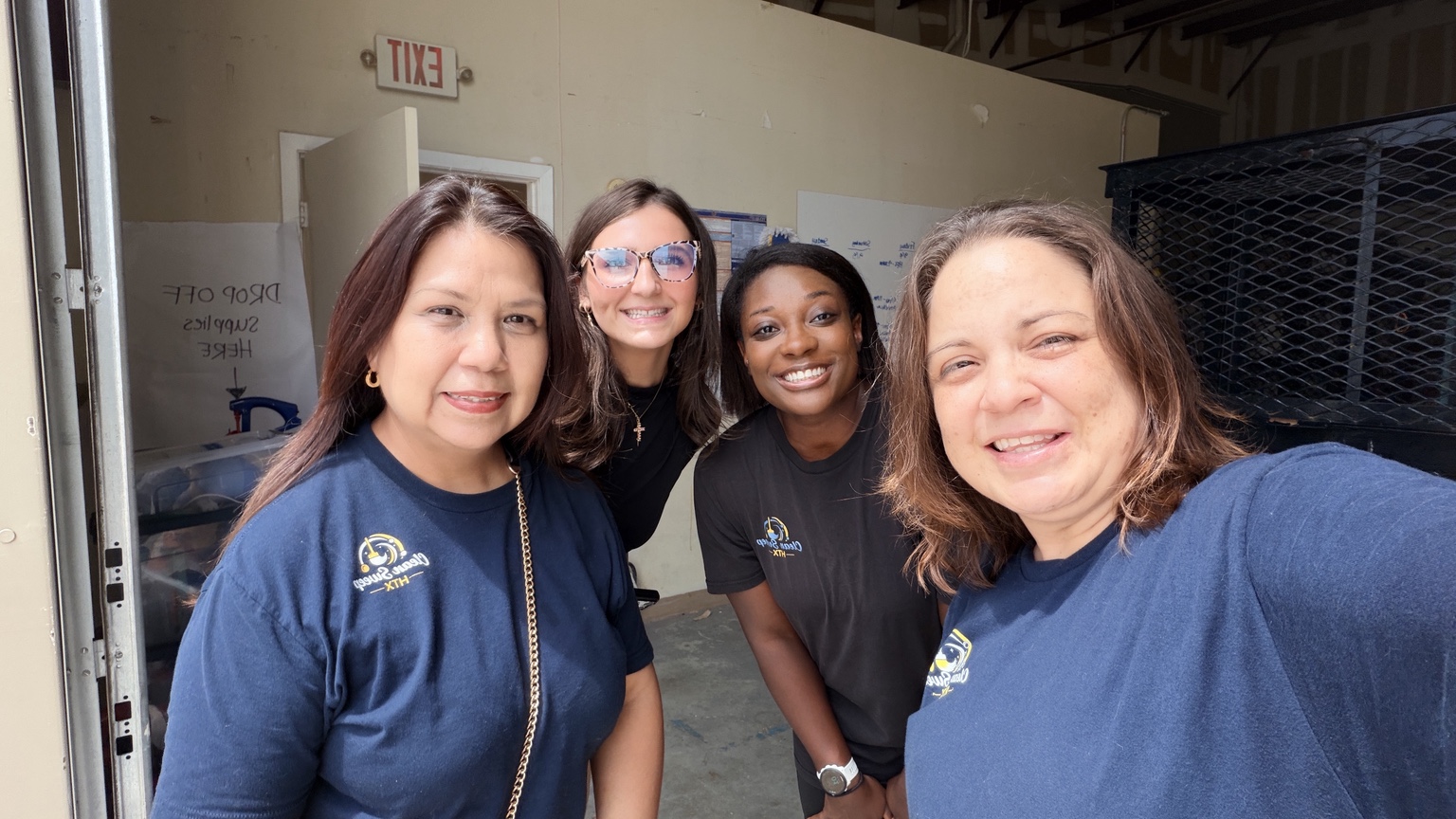 Clean Sweep HTX team members together at the office