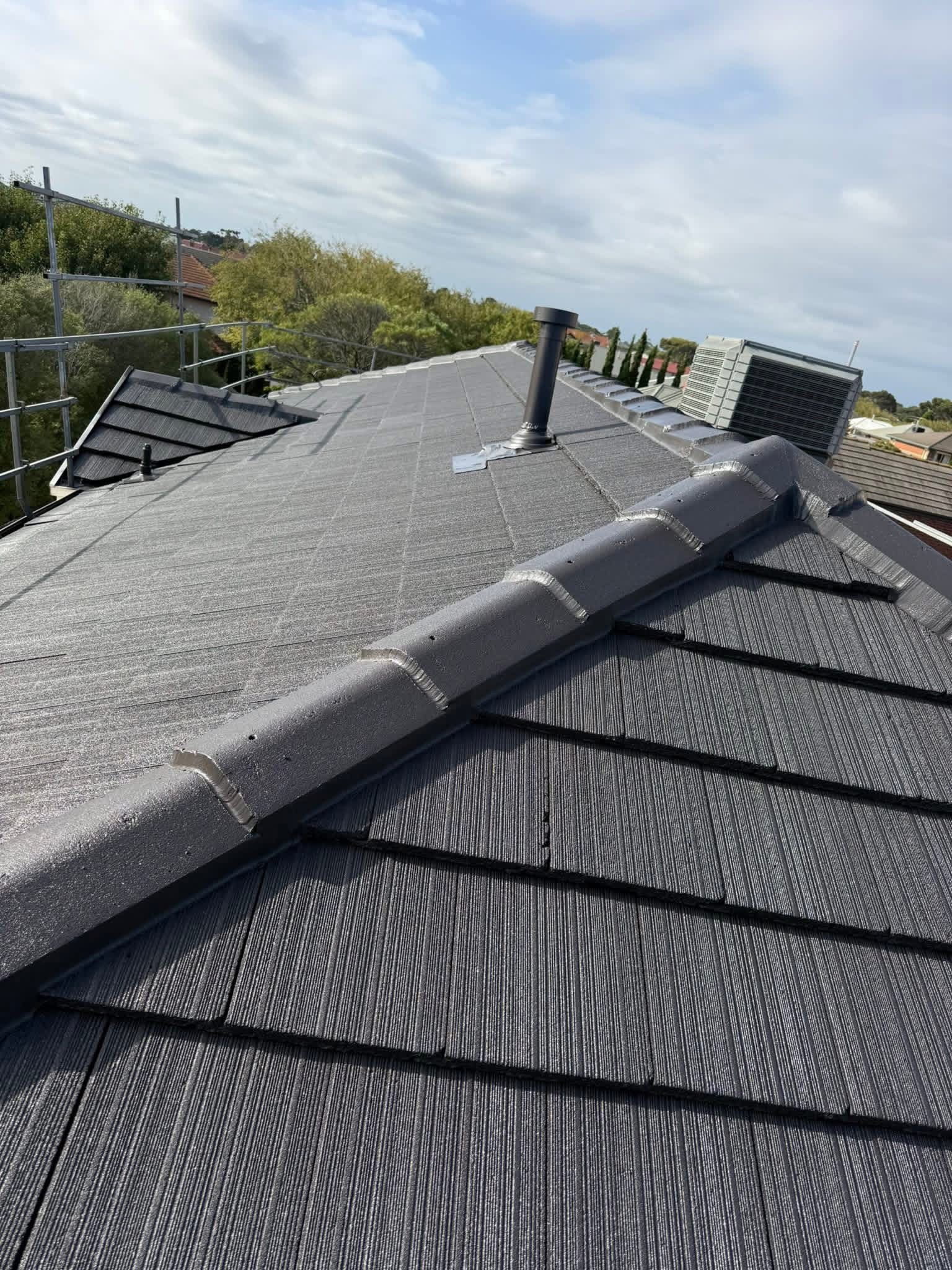 Charcoal restored tile roof