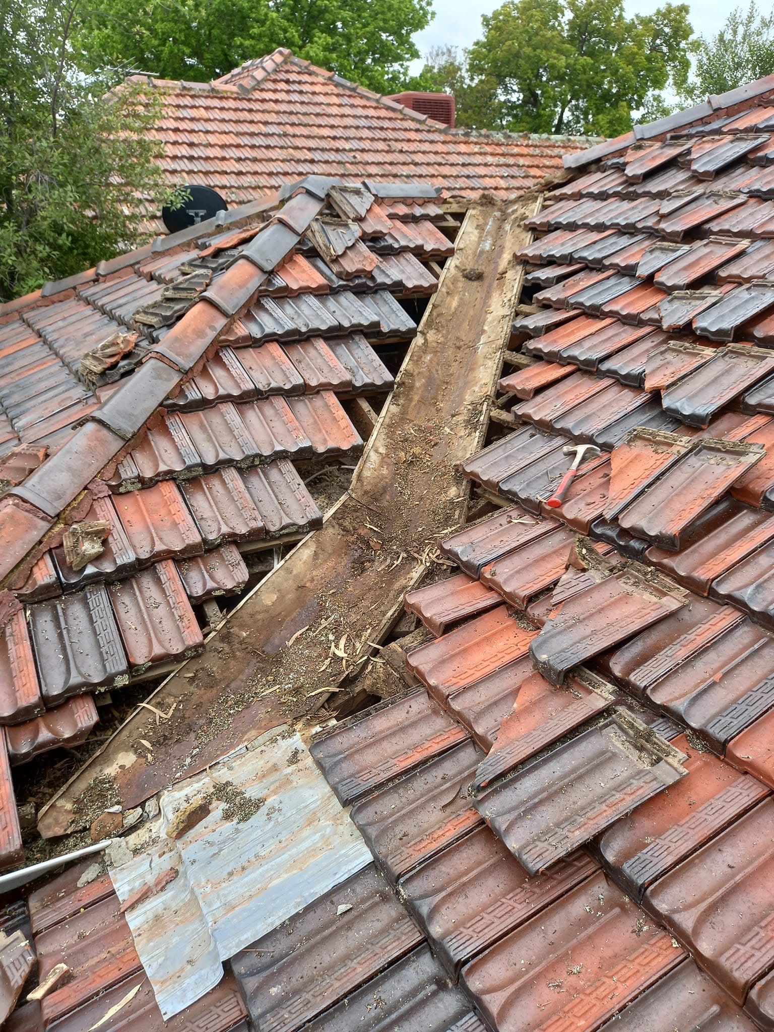 Severely damaged roof needing urgent repair